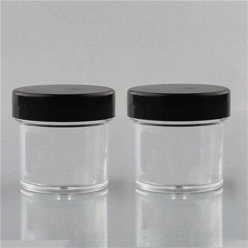 clear jar with black lid