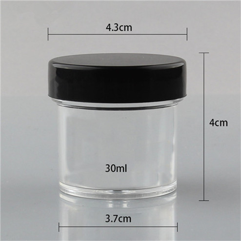 clear jar with black lid