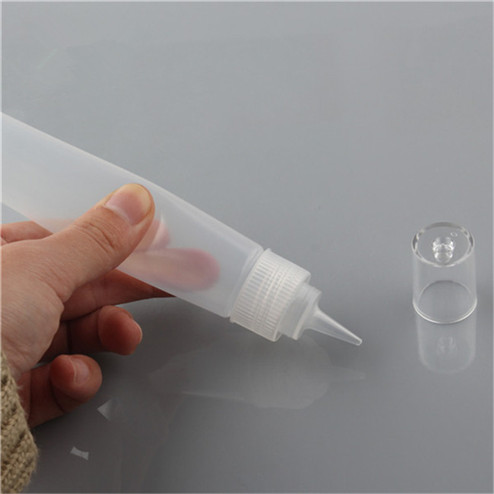 1oz LDPE tottle bottle with lanyard hole