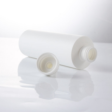 white cylinder round bottle